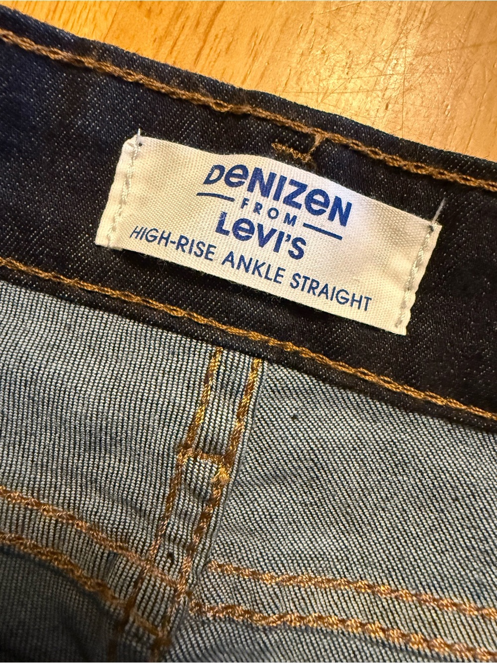 Denizen from Levi's Men's Straight Jeans in Light Blue with Dark Waistband